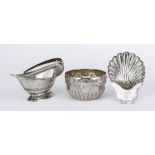 A George V Silver Oval Basket, a Victorian Circular Sugar Bowl and a Butter Shell, the basket by