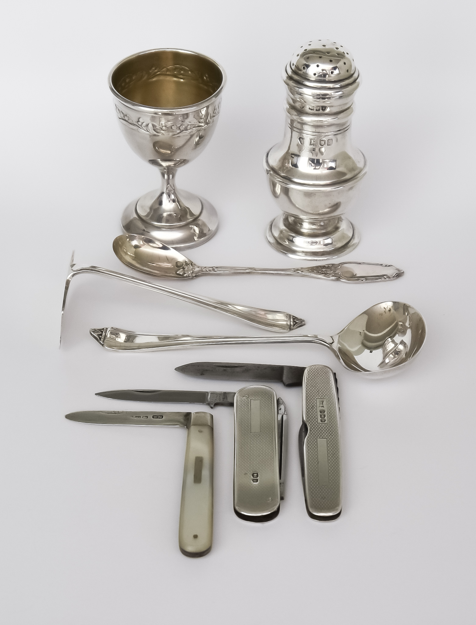 An Edward VII Silver Pepperpot and Mixed Silverware, the pepperpot by Holland Aldwinckle and Slater,