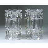 A Pair of Panel Cut Clear Glass Lustres, Late 19th Century, with nine prismatic drops, 7.25ins high