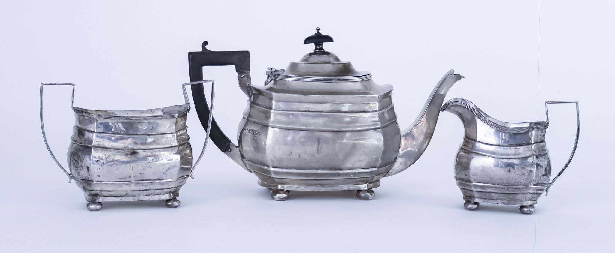 A George V Silver Rectangular Three-piece Tea Service, by George Nathan and Ridley Hayes, Chester