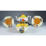 Crocus, a Clarice Cliff Bizarre Octagonal Teapot, Cover and Stand, a Honeyglaze Octagonal Teapot and