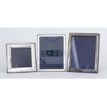 Three Elizabeth II Silver Photograph Frames, all by Carr's of Sheffield 1998-2003, comprising - a