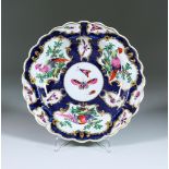 A Worcester Porcelain Dish of Shaped Outline, Circa 1765, enamelled in colours with exotic birds and