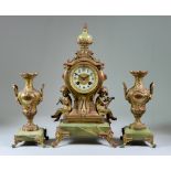 A Late 19th Century French Gilt Metal and Green Onyx Three-Piece Clock Garniture, by S. Marti and