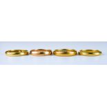 Four Gold Wedding Bands, comprising - one 22ct, size O, gross weight 4.5g, one 22ct (900), size L,