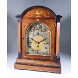 A Late 19th/Early 20th Century Rosewood Cased Mantel Clock, the 7.5ins arched brass dial with