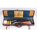 A 12 Bore Side by Side Shotgun by Holland and Holland, serial No. 21126, model Dominion, 30ins blued