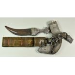 A Saudi Arabian Presentation Jambya Dagger, Early 20th Century, with silvery metal sheath and