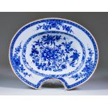 A Chinese Qianlong Blue and White Porcelain Oval Barber's Bowl, decorated with floral ornament