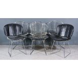 After Harry Bertoia (1915-1978) - A Set of Four Chrome Metal Mesh Single Chairs and a Pair of