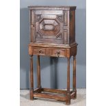 A 17th Century Oak Spice Cupboard, the interior fitted ten small drawers enclosed by one single