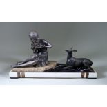 ***Ugo Cipriani (1887-1960) - Spelter group - Young woman seated next to a doe on a variegated