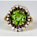A Peridot, Diamond and Ruby Cluster Ring, Modern, yellow metal set with a centre faceted green