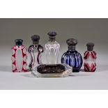 Six Cut and Flashed Glass Scent Bottles, 19th Century, all with silver tops, 2.75ins to 4.5ins