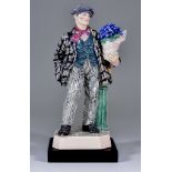 A Charles Vyse Pottery Figure - "The Cineraria Boy", circa 1925, modelled as a standing figure of