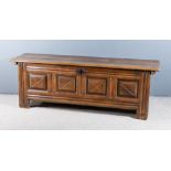 A Late 17th/Early 18th Century Panelled Oak Coffer, with two plank top and moulded edge, with four