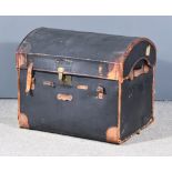 An Early 20th Century Black Canvas and Brown Leather Covered Trunk, with carrying handles to