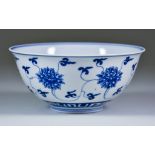 A Chinese Kangxi Blue and White Porcelain Circular Bowl, painted with lotus flowers, 6.5ins (16.5cm)