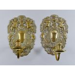 A Pair of Cast Brass Wall Sconces of Late 17th Century Design, the upper part with winged putti