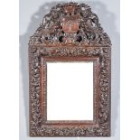A 19th Century Walnut Rectangular Wall Mirror of 17th Century Italian Design, the shaped cresting