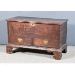 An 18th Century Oak Mule Chest, with plain top, fitted two drawers to base and on bracket feet,
