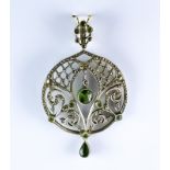 A Peridot and Marcasite Pendant, Early 20th Century, silvery coloured metal set with peridot stones,