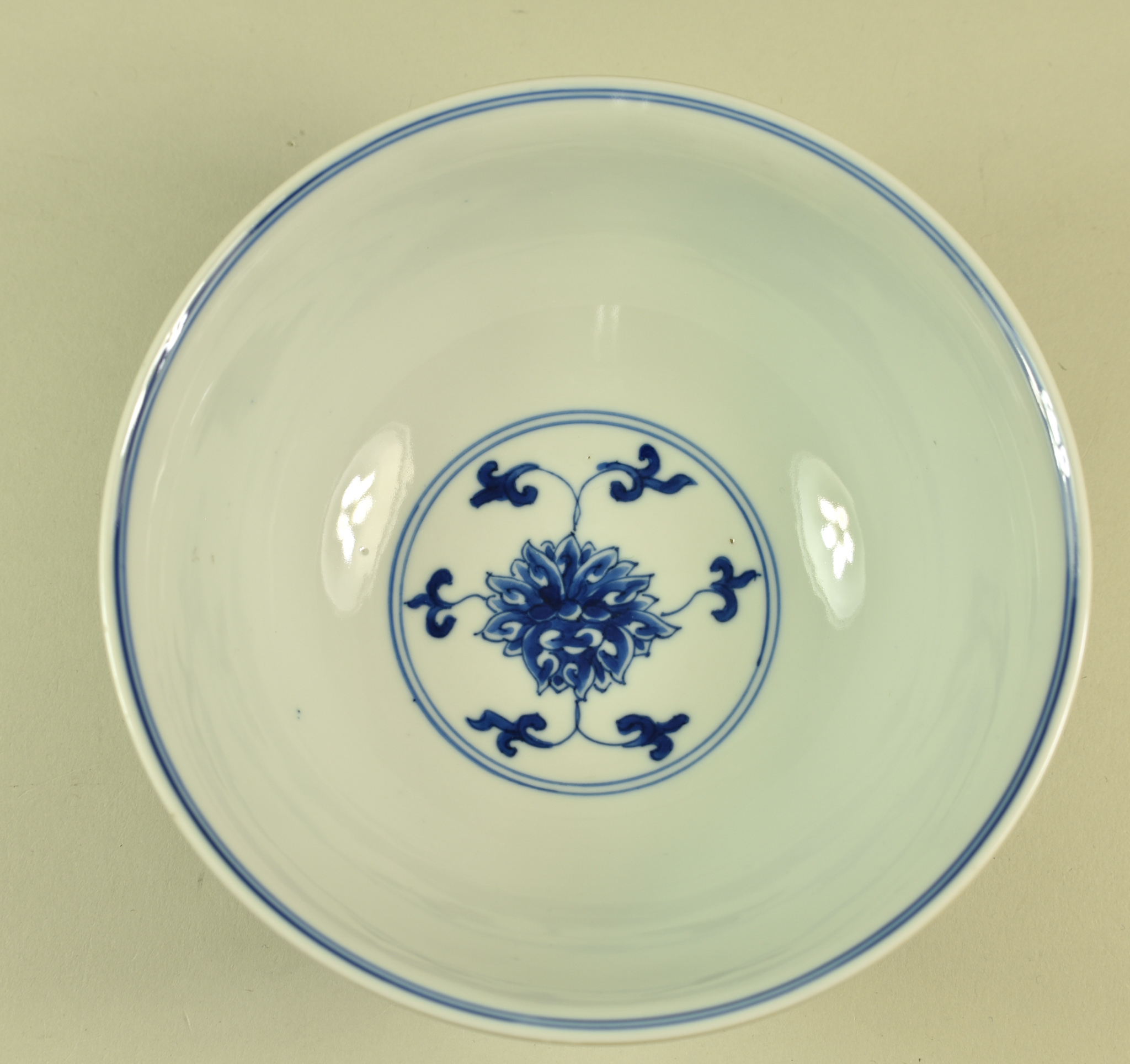 A Chinese Kangxi Blue and White Porcelain Circular Bowl, painted with lotus flowers, 6.5ins (16.5cm) - Image 4 of 8