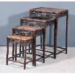 A Nest of Four Chinese Rosewood Rectangular Occasional Tables with carved bamboo pattern supports,