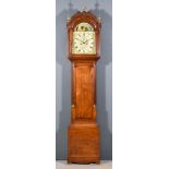 A 19th Century Oak Longcase Clock by Tanner of Lewes, the 12ins arched dial with Roman numerals,