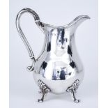 A Victorian Silver Baluster Shaped Jug by Charles Stuart Harris, London, 1889, with reeded rim and