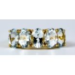 A Five Stone Aquamarine Ring, Modern, 14ct gold set with five faceted aquamarine stones, each