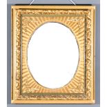 A 19th Century Gilt Framed Rectangular Wall Mirror, with shell and scroll moulded frame and inset