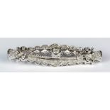 A Diamond Brooch, Modern, white metal set with brilliant cut white diamonds, approximately .30ct