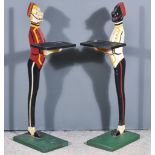 A Pair of Novelty Painted Wooden Dumb Waiters, on rectangular bases, each 34ins high