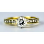 A Diamond Solitaire Ring, Modern, 18ct gold set with a centre brilliant cut white diamond,