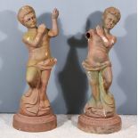 A Pair of Cast Iron Metal Figures of Cherubs/Putti on Turned Gadroon Bases, 16ins diameter x 48ins