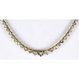 A Graduated Diamond Line Necklace, Modern, 14ct gold set with brilliant cut white diamonds,