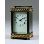 A Late 19th/Early 20th Century French Carriage Timepiece, the cream enamel dial with Arabic numerals