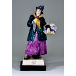 A Charles Vyse Pottery Figure - "The Pedlar", circa 1926, modelled as a standing lady holding