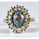 An Opal and Diamond Ring, Modern, 18ct white gold set with a centre triplet opal, approximately 10mm