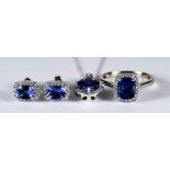 A Diamond and Tanzanite Suite, Modern, comprising - 14ct white gold ring set with a centre tanzanite