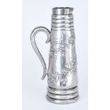 A Victorian Silver Cylindrical Jug, by FB Thomas and Co., London, 1883, of tapered form, embossed