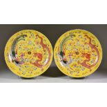 A Pair of Chinese Porcelain Polychrome Saucer Dishes, 19th/20th Century, enamelled in colours with