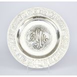 A Plated Offertory Dish, Late 19th/Early 20th Century, the raised centre with sacred monogram, 15ins