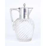 A French Silvery Metal Mounted and Spiral Reeded Glass Claret Jug, the plain mount with ball pattern