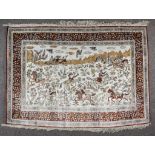 A 20th Century Silk Isfahan Picture Rug, woven in colours of ivory, terracotta and blue, the field