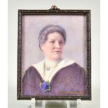 A Framed Miniature Portrait of a Woman, possibly wearing suffragette posy, by Bertha Fowle, 1925,