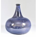 A Dutch Olive Green Glass Onion Shaped Wine Bottle, Mid 18th Century, 9ins high