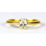 A Solitaire Diamond Ring, Modern, 18ct gold set with an oval diamond, approximately .50ct, size M,