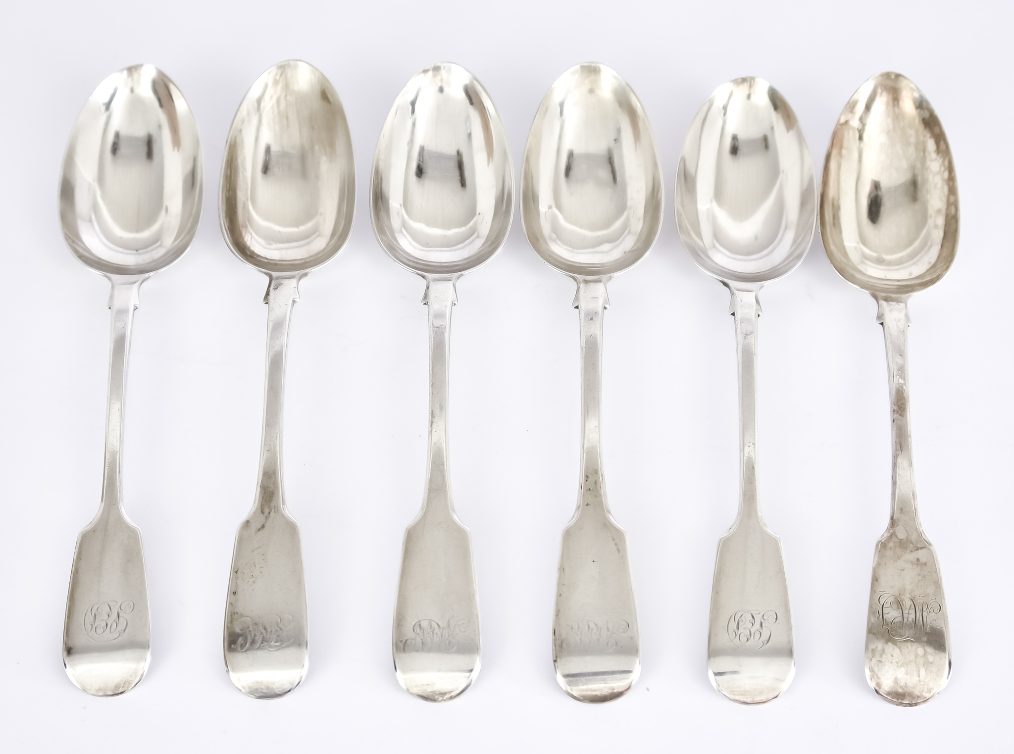 Six Georgian and Victorian Silver Fiddle Pattern Table Spoons, by various makers and dates, all